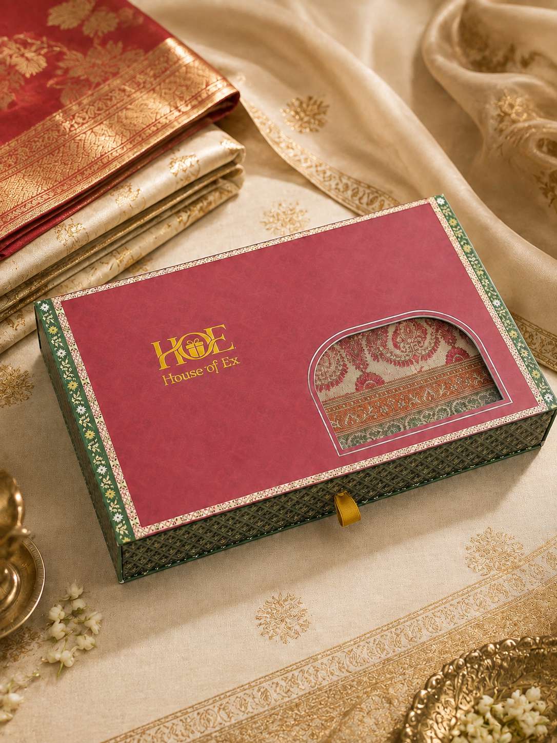 Pink slider box with die-cut window revealing printed contents